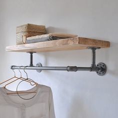 a pair of glasses hanging on a clothes rack