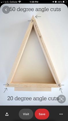 an image of a wooden triangle with measurements