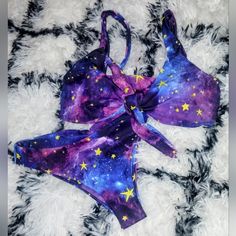 New Shein Brand 2pc String Bikini Swimsuit Size Small. Bought For My Daughter But It's Way Too Revealing For Her. Tie Front Top And Scrunchie Butt Bottom. Galaxy Star Space Design Sold Out Online.. Purple One-piece Tankini For Beach Season, Purple One-piece Tankini For Summer, Fitted Star Print Swimwear For Beach Season, Fitted Star Print Swimwear For Vacation, Purple One-piece Beachwear Swimwear, Purple One-piece Tankini For Pool, Star Print Swimwear For Beach Season Vacation, Purple One-piece Swimwear For Sunbathing, Purple One-piece Party Swimwear