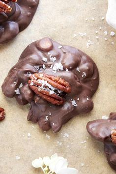 chocolate covered cookies with pecans and coconut flakes