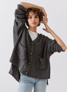 Staple cardigan from UO in a wool-blend with an easy and relaxed fit. Cropped to the waist with a v-neckline and long sleeves plus a button placket at the front. Finished with pockets at the front and split hems at each side. Content + Care - 53% Cotton, 23% recycled polyester, 8% nylon, 7% wool, 9% acrylic - Hand wash - Best stored folded Urban Outfitters Shop, Thick Cardigan, Chic Cardigan, Fall Cardigan, Tomboy Chic, Fleece Cardigan, Light Cardigan, Urban Outfitters Women, Oversized Cardigan