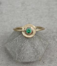 Vintage style gold ring with tiny green emerald stone 14K Gold ring Yellow gold Birthstone ring, Solid gold ring, Organic shape ring This dainty 14k Gold stackable Ring is made from 14k solid gold (you can choose 14k or 9k) it has an organic circle disc shape and features a green emerald gemstone that is bezel set in the center, Emerald is the birthstone for May, they are considered to be a symbol of rebirth and love. Delicate and minimalist, an excellent choice for anniversary gift, promise rin Dainty Gold Emerald Cut Emerald Ring, Fine Jewelry 14k Gold Green Emerald Ring, 14k Gold Green Emerald Ring, 14k Gold Green Emerald Ring, Fine Jewelry, Dainty Gold Solitaire Emerald Ring, Dainty Gold Emerald Ring For May Birthstone, Fine Jewelry 14k Gold Green Sapphire Ring, Green Emerald Birthstone Stackable Rings, Dainty Gold Emerald Ring With Round Band