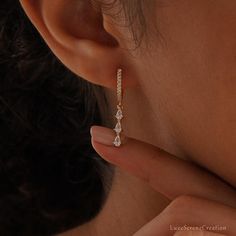 Crystal Huggie Earrings, Diamond Huggie Hoops, Tassel Diamond Earrings, Dangle Drop Earrings, Everyday Wear Earrings, Bridesmaid Gift for Her ❤ WHY YOU'LL LOVE IT * Exceptional Craftsmanship: Beautifully designed and built to last. * Meticulous Attention to Detail * Hypoallergenic, Nickel-Free & Safe for Sensitive Skin ❤ WHAT YOU'LL GET * A Heartfelt Product: A beautifully crafted item designed to captivate. * Packaged with ♡: Presented in a pretty little box, READY for GIFTING. * Finish: 18K Go Dangle Diamond Earrings, Diamond Huggie Earrings, Earrings Everyday, Earrings Bridesmaid, Diamond Dangle Earrings, Earrings Diamond, Earrings Studs, Wedding Idea, Huggie Earrings