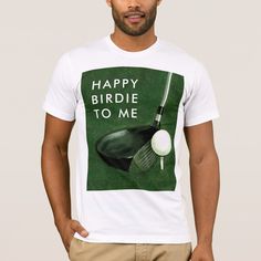 a man wearing a happy birdie to me t - shirt with a golf club and ball on it