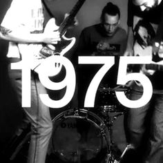 three men are playing guitars in front of a sign that reads, the band is 75 years old