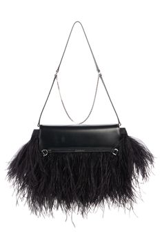 Cascading feathers bring decadent texture to an archival shoulder bag detailed with a chain strap that highlights Matthew Williams's hardware-heavy aesthetic. Front flap closure Shoulder strap Leather with feather trim Made in Italy Designer Handbags Luxury Evening Bag With Feather Trim, Luxury Evening Bags With Feather Trim, Luxury Formal Bags With Feathers, Luxury Formal Feathered Bags, Chic Formal Bags With Feathers, Formal Chic Bags With Feathers, Chic Formal Feather Bags, Chic Formal Feathered Bags, Chic Formal Bags With Feather Trim