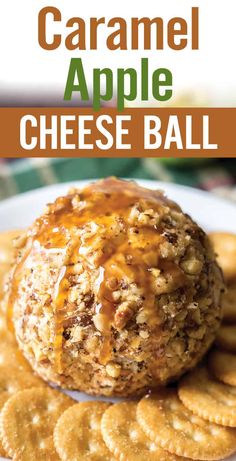 an apple cheese ball on top of crackers with caramel sauce in the middle