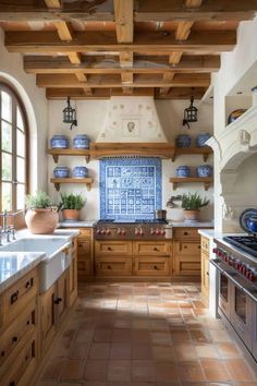 a kitchen filled with lots of wooden cabinets and counter top space next to an oven