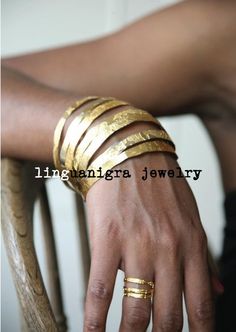 I LOVE THESE BANGLES TOO! This listing is for 1 single bangle. Hand etched bangle that is brass and plated in 22kt gold, this is truly stunning in person! - Small (2 1/4) is very small. Only order if you have trouble finding bangles for your small hands - Medium fits most sizes 2.5 inside Gold Etched Cuff Bracelet For Wedding, Gold Hammered Cuff Bracelet For Anniversary, Unique Gold Hammered Bracelets, Unique Gold Etched Cuff Bracelet, Unique Hammered Gold Bracelets, Unique Gold Engraved Cuff Bracelet, Unique Engraved Gold Cuff Bracelet, Gold Engraved Brass Cuff Bracelet, Engraved Gold Brass Cuff Bracelet