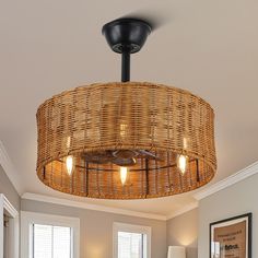 a wicker basket light fixture in a living room