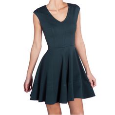 Hunter Green V-Neck Fit And Flare Dress Ponte Full Skater Dress. 68% Rayon 27% Nylon 5% Spandex Cap Sleeves Exposed Back Zipper Closure Approx Length: 34” Made In Usa Casual V-neck Elastane Mini Dress, V-neck Mini Dress For Evening Events, Lined V-neck Mini Dress For Work, Fitted V-neck Elastane Dress, Stretch V-neck Lined Mini Dress, Stretch V-neck Mini Dress, Lined V-neck Fit And Flare Mini Dress, V-neck Fit And Flare Mini Dress, Fit And Flare Mini Dress With V-neck