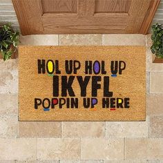 a door mat with words on it that says, hold up the skyl popin'up here