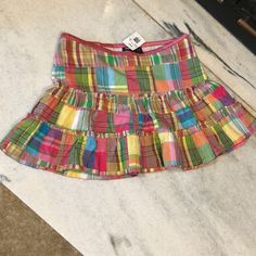 Nwt Vanity Plaid Skirt. Size 3. Skirt Has White Under Lay Material. Side Zipper. Great Condition. No Stains Or Holes. Waist 16” Length 13.5” Casual Multicolor Cotton Skirt, Casual Multicolor Mini Skirt, Casual Multicolor Maxi Skirt, Casual Multicolor Pleated Skirt, Casual Stretch Multicolor Skort, Casual Multicolor Lined Skirt, Multicolor Stretch Tiered Skirt, Fitted Multicolor Tiered Mini Skirt, Casual Multicolor Tiered Skirt