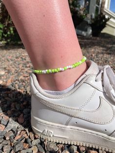 Shelly Bay anklet This is the perfect gift or accessory for anyone with a beachy aesthetic. If you need a custom size, message me before purchasing as i may not have enough supplies left. *materials: stainless steel wire coated with nylon, stainless steel curb chain (for the extender), seed beads *color: lime green, white *length: 8 inches with a 2 inch extender *closure: lobster clasp *to keep your jewelry in the best condition, avoid sleeping in, showering in, swimming in, exercising in your j Cheap Green Anklet As Gift, Casual Beaded Bracelets With Letter Beads For Beach Season, Trendy Summer Anklets With Round Beads, Casual Tiny Beads Bracelets For Beach Season, Casual Beaded Bracelets With Tiny Beads For Beach Season, Trendy Anklets For Beach Season Gift, Casual Anklets With Round Beads For Vacation, Casual Round Beads Anklets For Vacation, Handmade Trendy Anklets For Spring