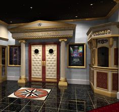 the room is decorated in gold and red with two doors on either side of the door