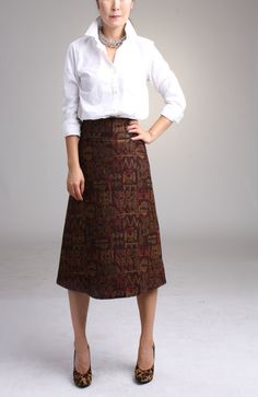 "Be right on fall style with Aline midi skirt in vintage style wool Brown wool skirt sits a little high on waist making your silhouette long and lean Midi length is super chic for this season Pair with simple top and heels or knee high boots to keep style minimal and polished This skirt has been super popular. Only one size 2 left. -Tailored fit -Waist sits above naval -Fully lined -Center back hidden zipper -Made of soft feel medium weighted wool blended fabric *Model is 26.5 waist, 36\"hips an Work Skirts Professional, Aline Skirt Outfit, Professional Skirts, A Line Skirt Outfits, Aline Midi Skirt, Brown Midi Skirt, Professional Skirt, Working Outfit, Wool Midi Skirt