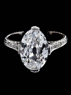 An Art Deco platinum and diamond ring Oval Diamond Engagement Rings, Vintage Platinum Rings, Vintage Engagement Rings Simple, Luxury Jewelry Store, Oval Jewelry, Cheap Engagement Rings, Vintage Inspired Rings, Engagement Rings Vintage Halo, Oval Diamond Engagement