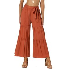 This pants fashioned with a ruffle hem and flowy wide legs,make it more loose and comfortable The flared leg trousers have over sized ruffling and an elastic waist for easy movement.In these sultry yet comfortable wide-leg pants, catch the breeze and plenty of double takes. Flowy wide-leg pants with an elastic waist cinched by an attached tie belt make these pants more distinctive and attention-grabbing.The relaxed fit and butterfly hem make them a great choice for spring and summer closets. Mea Flowy Wide Leg Pants, Wide Leg Lounge Pants, Wide Leg Palazzo Pants, Loose Trousers, Women's Tie, Over Sized, Comfort Wear, Womens Tie, Wide Legs