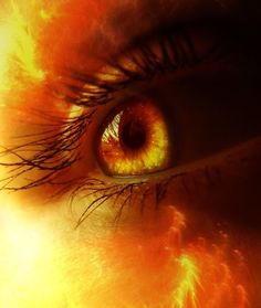 an eye with bright yellow and orange colors