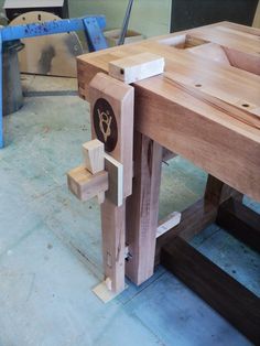 a wooden workbench with scissors on it