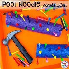 an orange tray with construction materials and a hammer on it, next to the words pool noodle construction