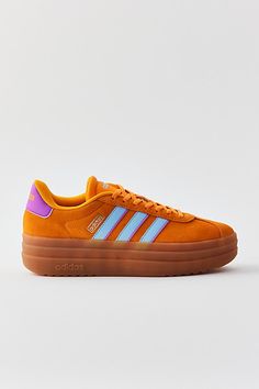 adidas VL Court Bold sneakers - a bold suede sneaker from adidas set on a platform sole. Features adidas VL Court Bold sneakers Elevated adidas shoes Suede platform sneakers Classic adidas stripes at the side Comfy padded insole Platform sole Lace-up sneaker style Content + Care Suede, synthetic, rubber Spot clean Imported | adidas VL Court Bold Sneaker in Orange, Women's at Urban Outfitters Platform Adidas, Adidas Platform Sneakers, Adidas Vl Court, Adidas Set, Orange Fits, Classic Adidas, Sneaker Style, Synthetic Rubber, Suede Sneakers