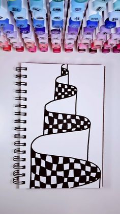 a drawing of a cake with checkered design on it