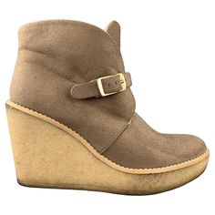 STELLA MCCARTNEY ankle booties come in vegan faux shearling suede with a strap closure and gum wedge sole. Made in Spainches Good Pre-Owned Condition. Marked: IT 37 Measurements: Heel: 3.75 inches Platform: 1 inches Reference: 93607 Category: Boots More Details Brand: STELLA McCARTNEY Size: 7 Color: Taupe Pattern: Solid Style (Boot's): Ankle Type of Leather: Faux shearling Style: Wedge Age Group: Adult Gender: Female Wedge Boots, Cotton Totes, Ankle Booties, Wedge Boot, Stella Mccartney, Clothing And Shoes, Gum, Shoe Boots, Second Hand