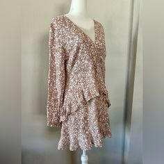 Altar’d State Long-Sleeved Floral Mini-Dress - Dusty Tan / Pink In Color - Size Large - Zip Up - Faux Wrap - Sits Mid-Thigh - Layered In Design Long Sleeve Brown Dresses For Day Out, Long Sleeve Ruffle Hem Dress For Day Out, Long Sleeve Dresses With Ruffle Hem For Day Out, Long Sleeve Brown Dress For Day Out, Beige Long Sleeve Dress For Brunch, Fitted Beige Dress With Ditsy Floral Print, Brown Long Sleeve Dresses For Brunch, Beige Long Sleeve Dress For Day Out, Brown Long Sleeve Dress For Brunch