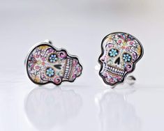 Elevate your ensemble with our exquisite engraved cufflinks, a stunning addition to your collection. Our customized cufflinks, including groomsmen cufflinks and groom cufflinks, redefine style with vibrant and colorful skull designs, perfect for both formal and informal events. These eye-catching accessories add a playful touch to any shirt, ensuring you stand out effortlessly. KEY FEATURES 🌟 Personalize your style with our unique custom cufflinks 🎨 Unleash creativity with customized cufflinks that suit any occasion, including wedding cufflinks. 🎁 Each pair comes with a luxurious cufflink box, personalized with your chosen engraved message. ✒️ Express yourself further with up to three lines of text through personalized engraving. Complete your look with these bespoke accessories - the e Custom Cuff Links, Cuff Links Wedding, Skull Cufflinks, Groomsmen Cufflinks, Skull Designs, Watch Cufflinks, Engraved Cufflinks, Groom Cufflinks, Custom Cufflinks