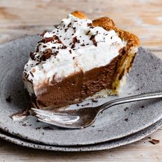 a slice of chocolate pie on a plate with a fork