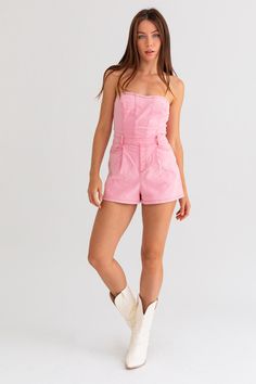 An exclusive, limited edition denim tube style romper in a light pink shade. Model sizing: True to size but if you are in-between sizes, we recommend sizing up. Model is wearing a size small. Height: 5'8" Bust: 32A Waist: 24" Hips: 34" Fabric content: 70% Cotton, 27% Polyester, 3% Spandex Strapless Denim Jumpsuit With Pockets For Summer, Casual Strapless Denim Jumpsuit For Spring, Casual Strapless Denim Jumpsuit With Pockets, Strapless Denim Jumpsuit For Summer, Summer Strapless Denim Jumpsuit, Trendy Strapless Jumpsuit With Pockets, Casual Strapless Cotton Jumpsuit/romper, Fitted High Waist Cotton Strapless Jumpsuit, Trendy High Waist Strapless Jumpsuit With Pockets