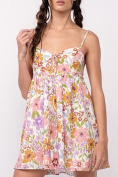 The Andriana Lavender Floral Babydoll Cami Mini Dress will have you looking good all season long! Lavender, white, pink, mustard, and sage floral fabric forms this front tie mini dress with adjustable cami straps and cutout bodice. Attached mini skirt falls from an empire waist. The cutout back finishes the look! Style with slip-on sandals for a casual look! DETAILS & CARE 100% Cotton. 100% Polyester Linning. Machine wash cold. Imported. Babydoll Cami, Cami Mini Dress, Europe Outfits, Casual Preppy Outfits, Lavender Floral, Mini Cami Dress, Fall Skirts, Preppy Outfits, Babydoll Dress