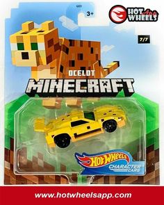 a yellow die - cast car with a dog on it's head and the words hot wheels