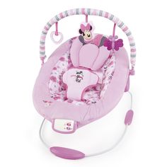 a pink baby swing with minnie mouse on it