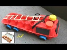 a toy fire truck with eggs in it