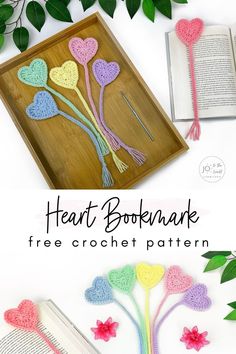 the crochet bookmark is made with hearts and flowers