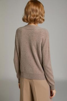 Fit: Regular fit Detail: Long sleeve. Solid color. Wool. Button-down. Material: 96%-99% Wool Care: Put your garment in the washing bag. Wash by hand or on a wool or delicate program in the machine. Beige Cashmere Cardigan With Button Closure, Beige Wool Long Sleeve Cardigan, Crew Neck Cashmere Sweater With Buttons, Cashmere Long Sleeve Sweater With Button Closure, Cashmere Crew Neck Sweater With Buttons, Classic Soft Knit Long Sleeve Cardigan, Winter Beige Cardigan With Button Cuffs, Classic Long Sleeve Soft Knit Cardigan, Beige Sweater With Button Cuffs For Winter