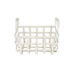 a white basket that is on top of a table and has handles to hold it