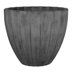 a large gray planter sitting on top of a white surface with lines drawn across it