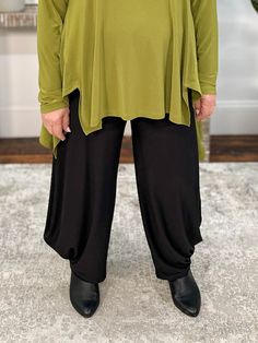 Chalet's Baylee Pant is a fresh take on a lantern style with a out-seam that creates a draped hemline at sides. It's wide pull-on waist features side seam pockets. Fit fact: True to size Lisa (size 12/14, 5'31") models size L. Andrea (size 18, 5'3") models size 1X. Stretch jersey knit 95% Polyester, 5% Spandex Hand wash cold, Tumble dry gentle Made in USA Style # Y28633