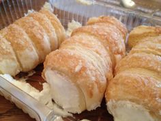 several pastries sitting on top of a glass plate