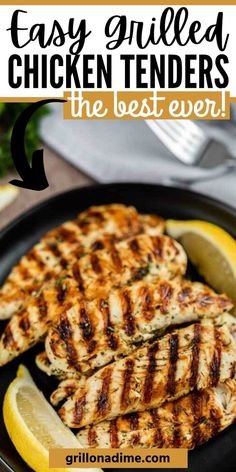 grilled chicken tenders on a plate with lemon wedges