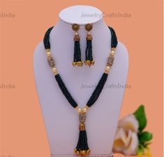 Oxidized Green beaded necklace with  Black Marka tumble   Necklace Length: 12 inches Earrings Length: 3.5 Inches This piece of necklace set with Gold polish looks so beautiful with every dress you wear. This Trendy Necklace Go With Everything In Your Closet, From Your Day-To-Day Office Attire to any Special Occasions. Perfectly fit for you to attend any special occasions such as dinner party, birthday party, wedding, festival celebration, graduation, concert, anniversary, dancing ball, baby show Traditional Green Necklace With Oval Beads, Traditional Black Necklace With Oval Beads, Traditional Green Hand-strung Beaded Necklaces, Traditional Multi-strand Black Beaded Necklaces, Black Multi-strand Beaded Necklace For Evening, Pearl Mala, Green Beaded Necklace, Bollywood Jewelry, Beaded Jewelry Designs