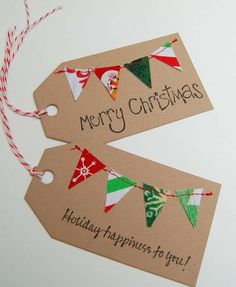 two tags that say merry christmas and have pennants on them with the words holiday happiness to you