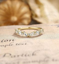 a close up of a ring on top of a piece of paper