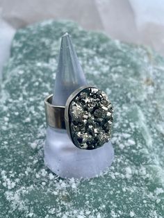 Handmade Adjustable Ring by Leo in Peru. Alpacca Silver with Pyrite Stone Size 8.5-11.5 Pyrite-ATTRACTING WEALTH,WEALTH,SUCCESS,PROTECTION-Often referred to as "Fool's Gold" for its resemblance to real gold, Pyrite is a metaphysical treasure. In addition to attracting wealth and abundance, it's believed to hold a strong protective energy. The reflective nature of pyrite is more than just physical. It has the ability to show you which of behaviors are holding you back, which makes your energy. Th Pyrite Stone Meaning, Handmade Silver Pyrite Jewelry, Pyrite Ring, Attracting Wealth, Protective Energy, Pyrite Stone, Wealth And Abundance, Pyrite Crystal, Iron Pyrite