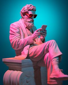 a statue of a man sitting on top of a bench holding a cell phone in his hand