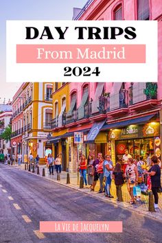 people walking down the street in madrid with text overlay reading day trips from madrid