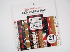 the little lumber jack paper pad is on display in front of a white background with black and red plaid patterns